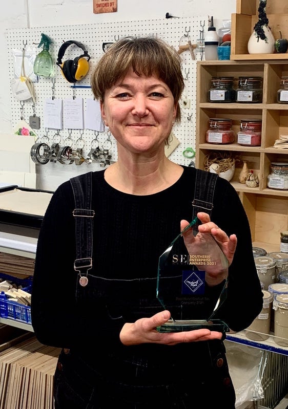 Mel with her Best Hand Crafted Tile Company Award 2021