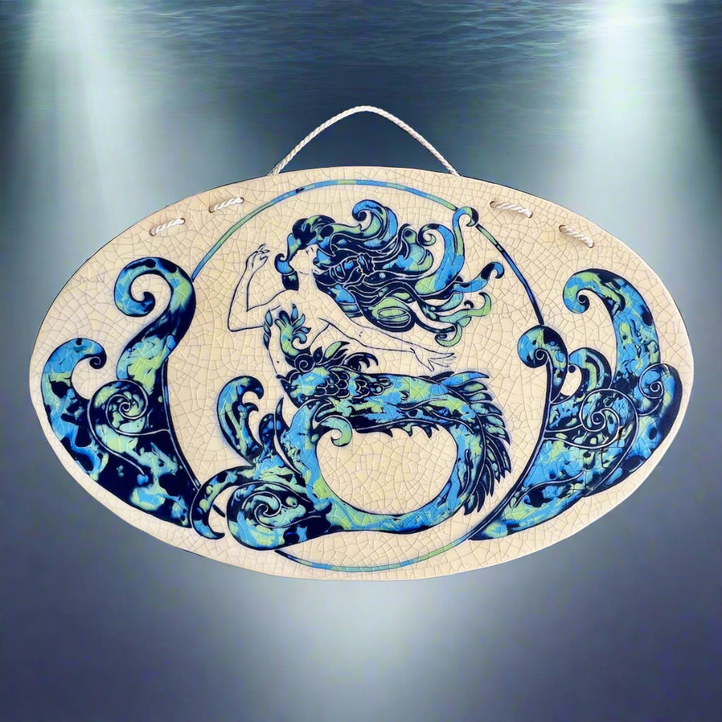 Decorative ceramic wall tile with Art Nouveau mermaid design on a crackle glaze background