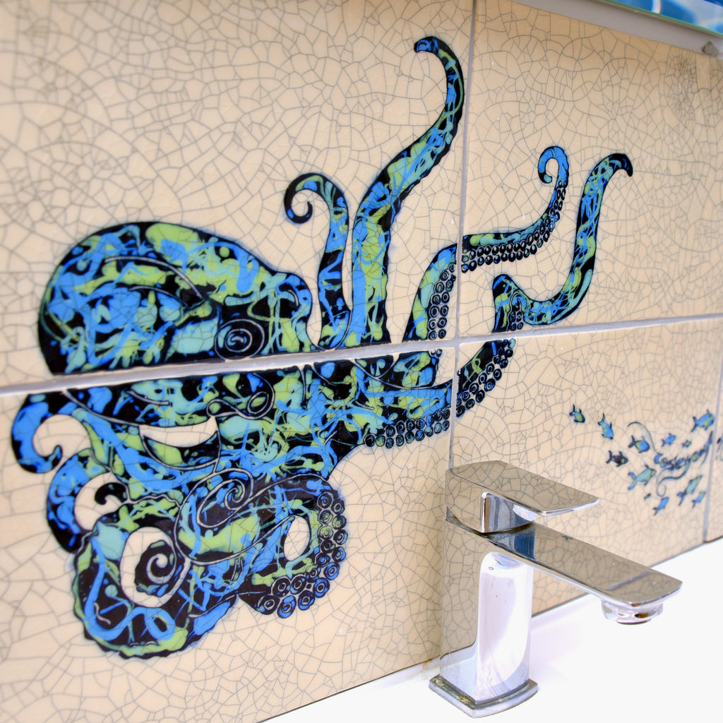 Encaustic ceramic tiles sink splash back with hand carved and inlaid turquoise octopus and school of fish.