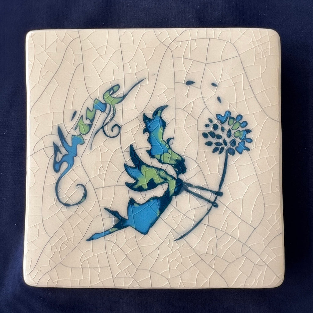Square ceramic coaster with a fairy design on a crackle glaze beige background