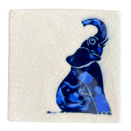 Square ceramic coaster with a blue elephant design on a crackle glaze background